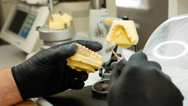 istock Manufacturing of dentures 1555185331