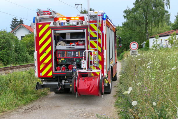 istock Storm damage. Fire truck during the operation. 1555188692