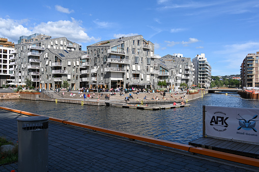 Oslo, Norway, July 5, 2023 - The Bjorvika canal buildings in Oslo.