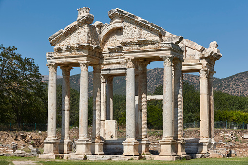 The Temple of Apollo is located at the end of Side's peninsula. Side is a city on the southern Mediterranean coast of Turkey. It includes the modern resort town and the ruins of the ancient city of Side, one of the best-known classical sites in the country.