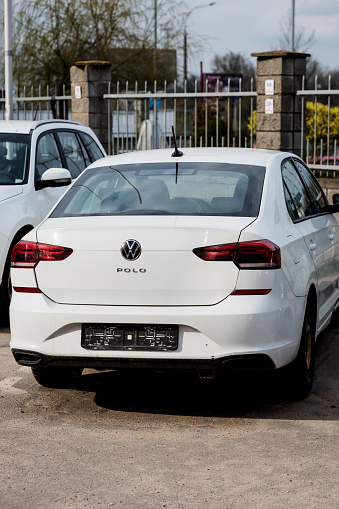 Minsk, Belarus, July 2023 - Rear view white Volkswagen Polo on parking lot