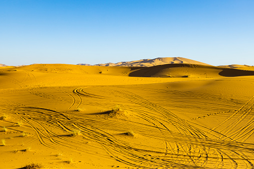 Sand dunes in the desert, Merzouga, Erg Chebbi sand dunes region, Sahara, Morocco.