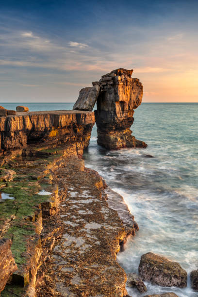 Dusk at Pulpit Rock at Portland Bill on the Dorset Jurassic Coast.