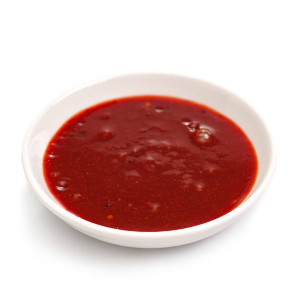 istock Kimchi sauce in a bowl on a white background. For the restaurant menu. 1555264243