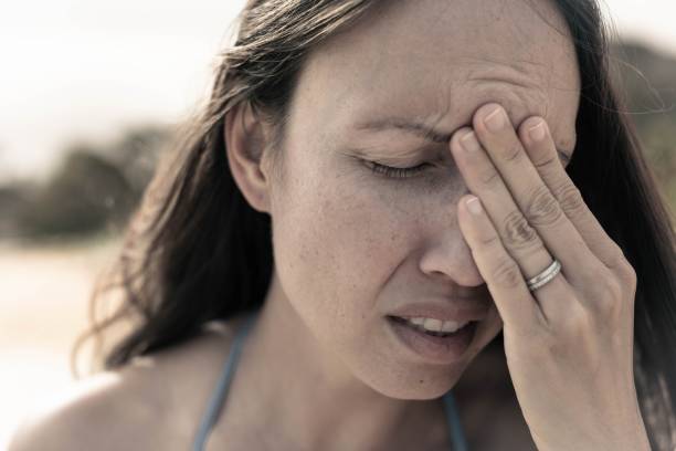 istock A sad depressed woman crying. Marriage and relationship problems. 1555308848