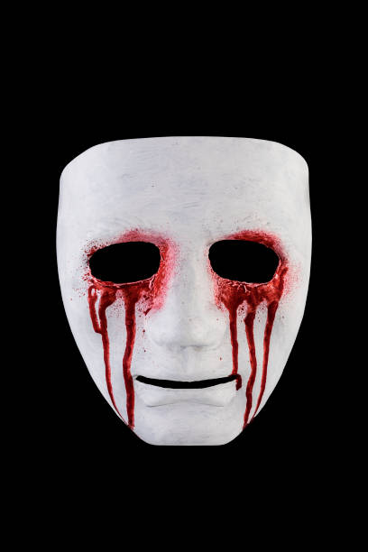 istock Creepy bloody mask isolated on black background with clipping path 1555330748