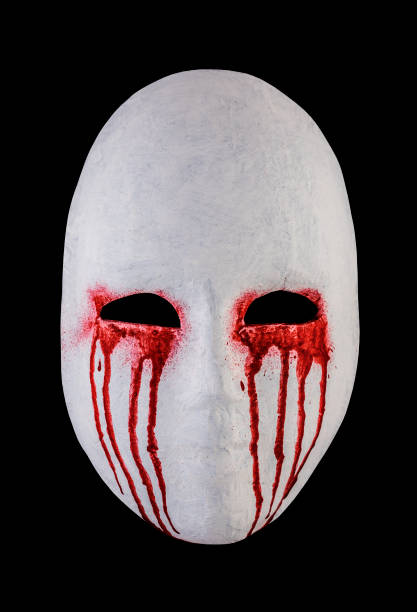 istock Creepy bloody mask isolated on black background with clipping path 1555332902