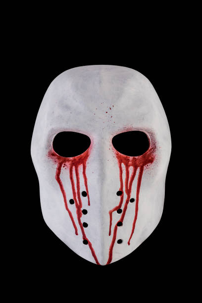 istock Creepy bloody mask isolated on black background with clipping path 1555332914