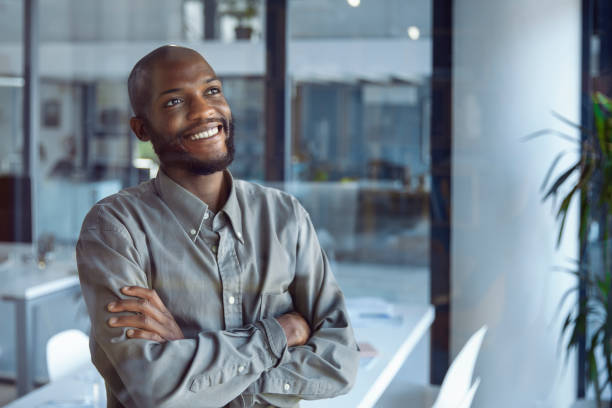 istock Glimpses of Opportunity: A Businessman's Window Reflection 1555354200
