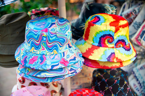 Colourful hats in a shop.