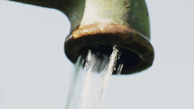 Close up of clean drinking water from the pump