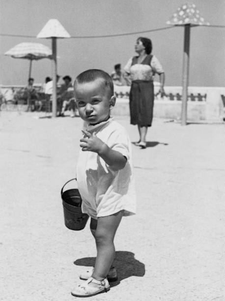 istock Child at the beach. 1555379161