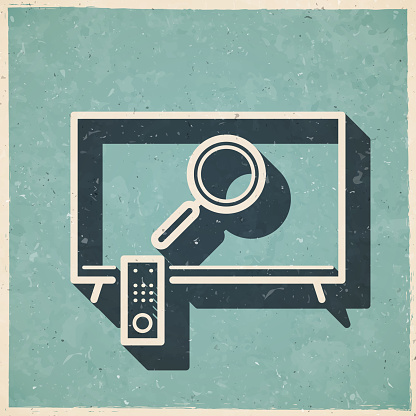 istock Magnifying glass on TV. Icon in retro vintage style - Old textured paper 1555399949