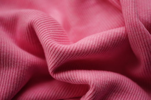 jersey pink fine ribbed pattern, soft wrinkled fabric