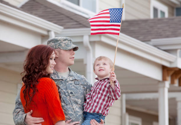 istock Army Family Series: Real American Soldier with Wife & Son 155541438