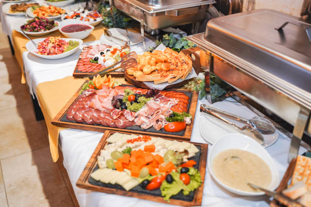 istock Buffet table with various types of food 1555422680