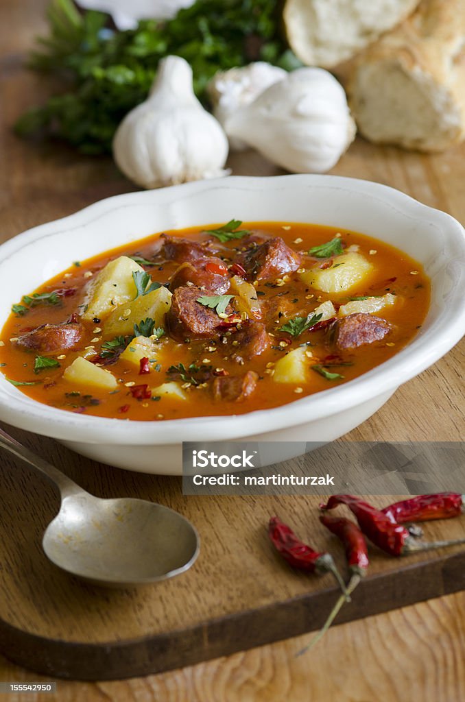 Spanish soup Spanish potato, garlic and chorizo soup in a bowl Potato Soup Stock Photo