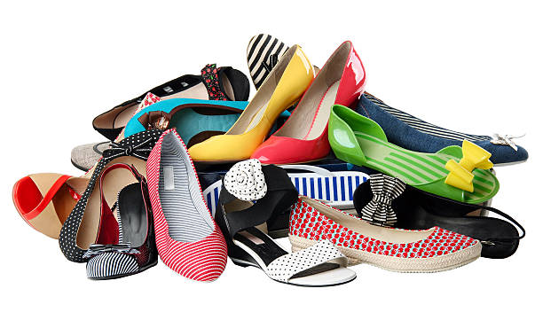 istock A pile of multi-colored and patterned women's shoes 155543592