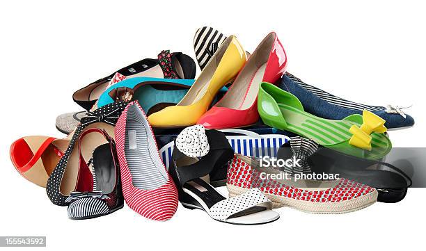 A Pile Of Multicolored And Patterned Womens Shoes Stock Photo - Download Image Now