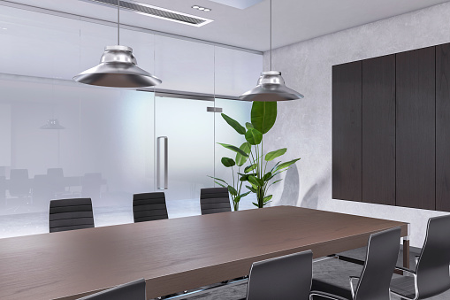 Perspective view of modern empty boardroom interior with office desk and chairs, matte glass wall and grey carpet floor. 3D Rendering