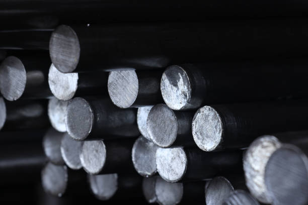 Round steel shaft in the factory warehouse stock photo