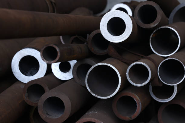 istock Steel pipe in the factory warehouse 1555470078