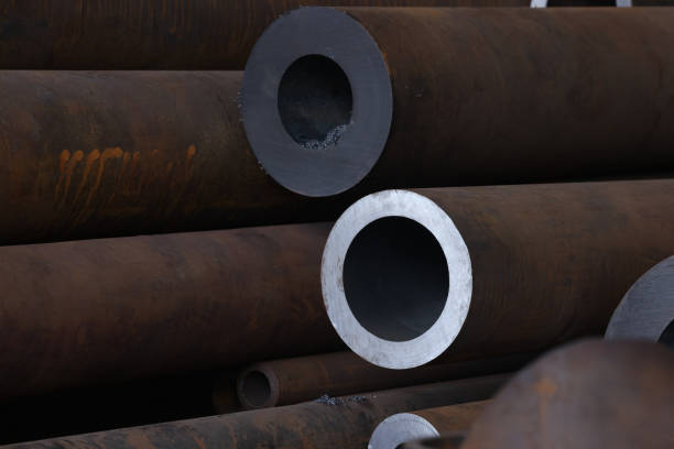istock Steel pipe in the factory warehouse 1555470625