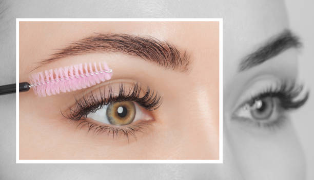 Beautiful Woman with long eyelashes in a beauty salon. Eyelash extension procedure. Cosmetology skin care Beautiful Woman with long eyelashes in a beauty salon. Eyelash extension procedure. Cosmetology skin care hair care women mature adult human skin stock pictures, royalty-free photos & images