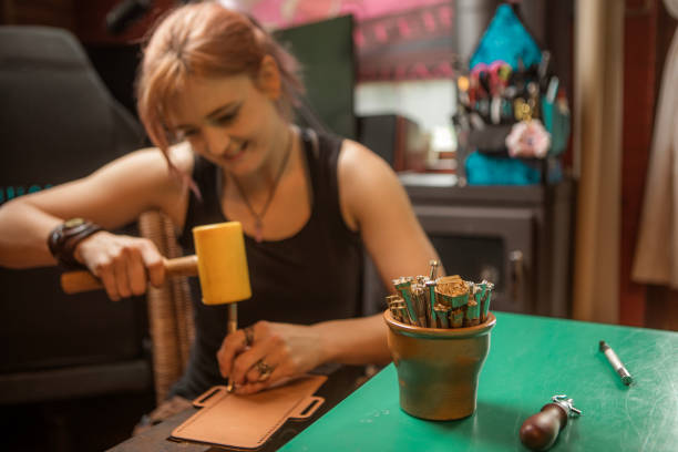 istock Young woman arts and craft expert in her studio 1555488964