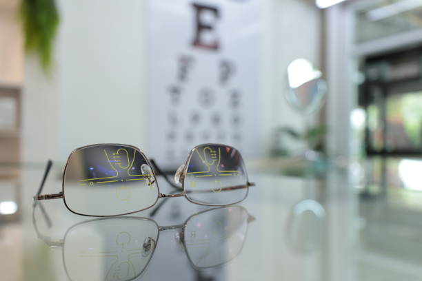 istock Eyeglass progressive lens, glasses in optical shop 1555492228