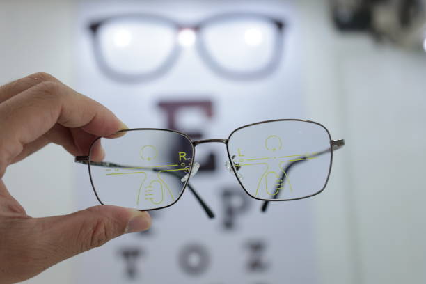 istock Eyeglass progressive lens, glasses in optical shop 1555493855