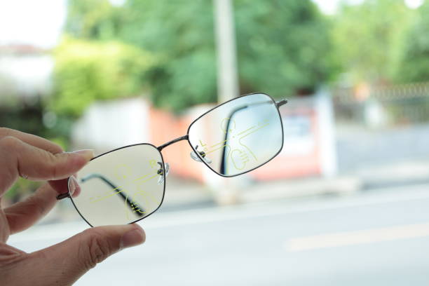 istock Eyeglass progressive lens, glasses in optical shop 1555494408