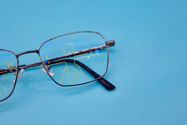 istock Eyeglass progressive lens, glasses in optical shop 1555495494