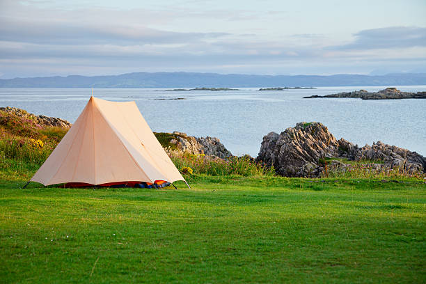 istock Camping tent on ocean shore 155550705