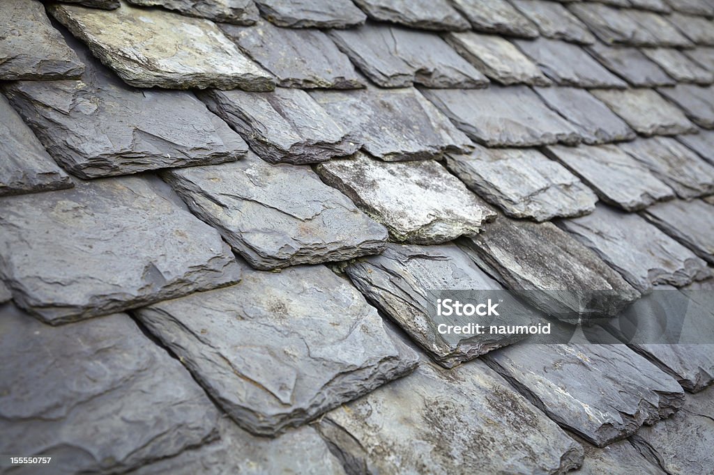 Slate Roof Aged slate roof tiles close-up Rooftop Stock Photo