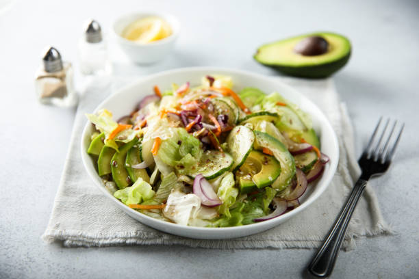 istock Vegetable salad with avocado 1555510788