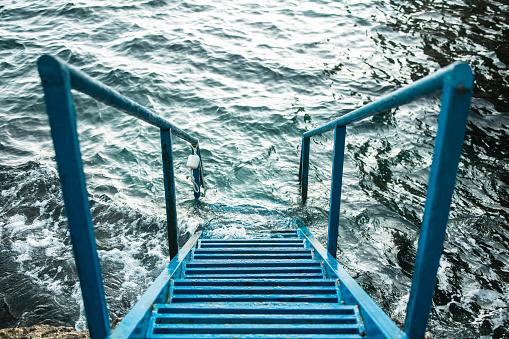 Blue metal stairs to the Adratic sea. Albatros, Ulcinj, Crna Gora