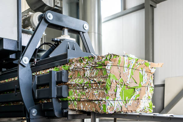 paper recycling truck and forklift loading old papers paper recycling truck and forklift loading old papers reuse manufacturing sourcing stock pictures, royalty-free photos & images