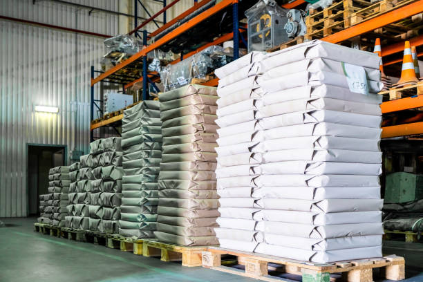 istock Big warehouse with paper rolls and printing material 1555555644
