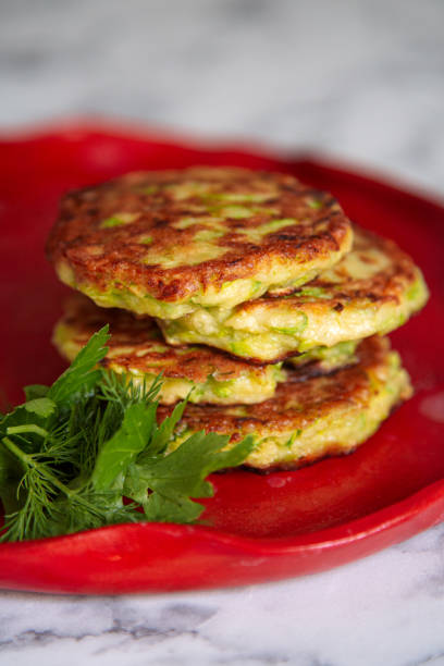 istock fried zucchini fritters with herbs. 1555563666