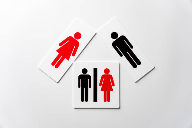 istock Restroom sign on white background 1555564722