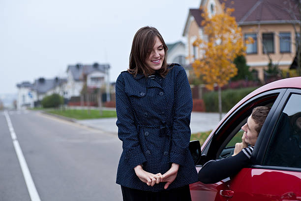 istock young woman is talking to man 155556611