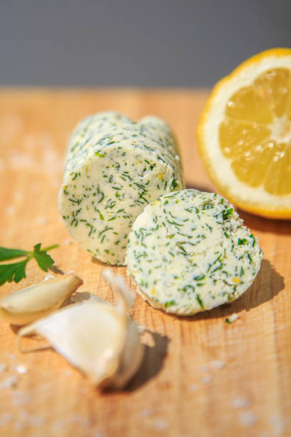 Butter stick with a knife and defocused sliced bread.
