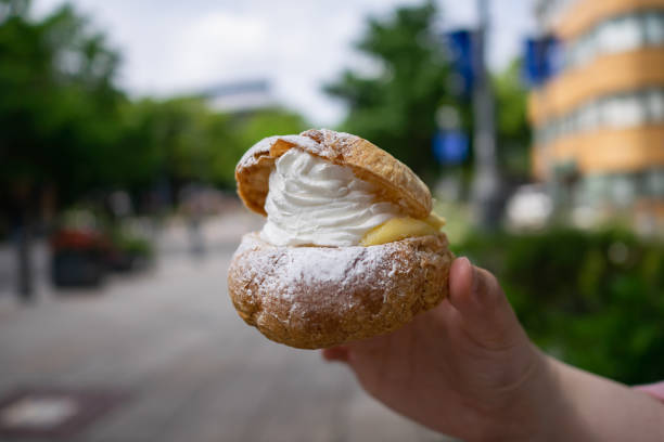 istock Cream puff with whipped cream and custard cream. 1555605919