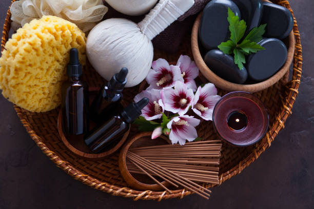 istock spa setting with hibiscus flowers on brown 1555623194