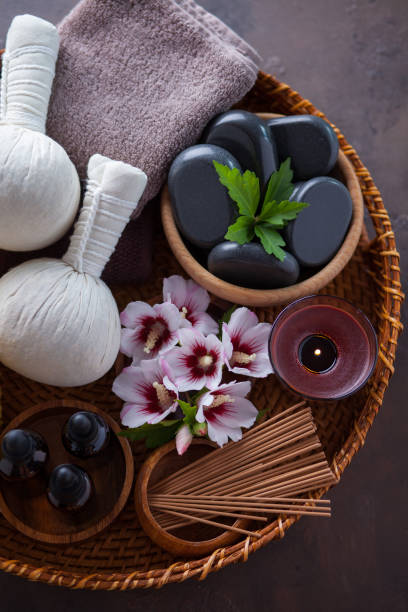 istock spa setting with hibiscus flowers on brown 1555623197