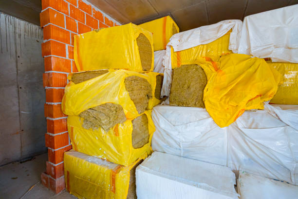 istock Stack of thermal insulation material is wrapped with cellophane foil 1555644674