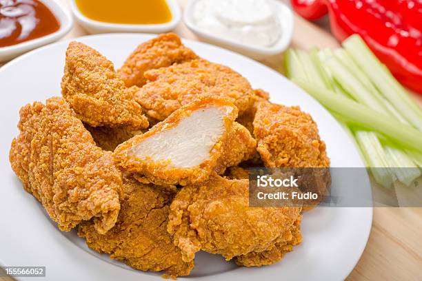 Chicken Nuggets - Fotografias de stock e mais imagens de Almoço - Almoço, Assado, Branco