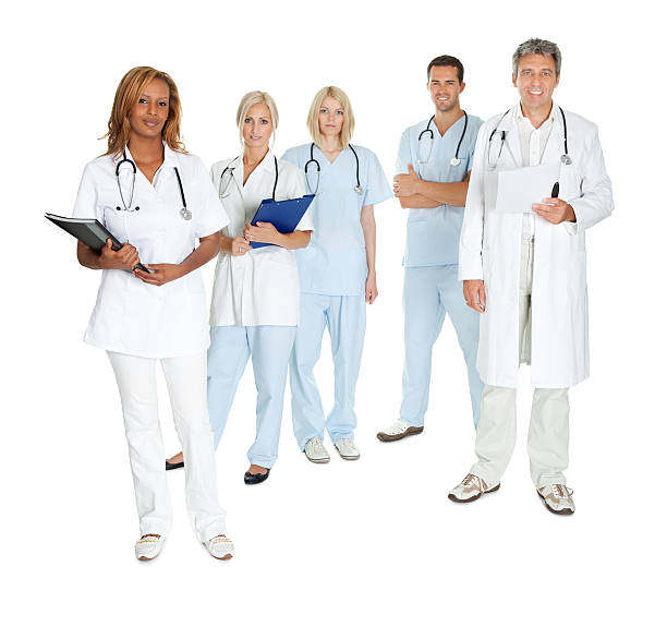 istock Happy team of doctors and surgeons on white 155567346