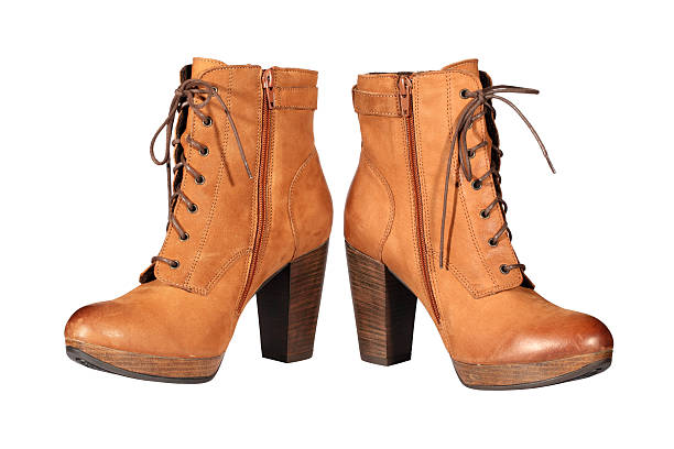 istock Pair of brown female boots. 155569005
